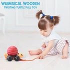 Palm Naki Whimsical Wooden Twisting Turtle Pull Toy 1 Multicolor 808218695632 No Promo Code Needed!
